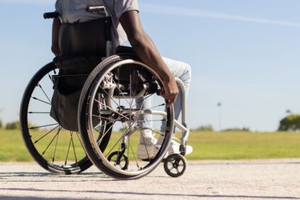 Patient with spinal cord injury uses wheelchair