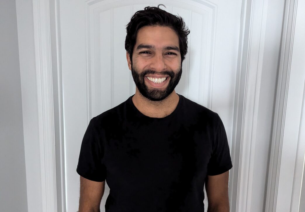 Headshot of Qayyum Rajan smiling